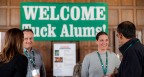Alumni talking in Stell Hall during reunion
