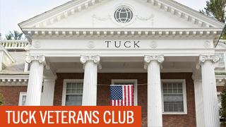 Tuck Veterans Club - Tuck Hall with American Flag